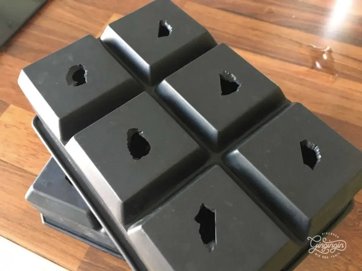 silicone ice cube molds with punched through holes